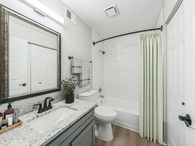 Elevate your living at Eagle Rock Apartments at Columbia, where modern design meets comfort. This stunning bathroom features elegant finishes and ample space for your relaxation needs. Schedule a visit today and envision your new home!