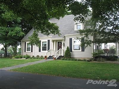 Beautiful updated home on 18 gently rolling acres. Homes features two porches, window replacements, 