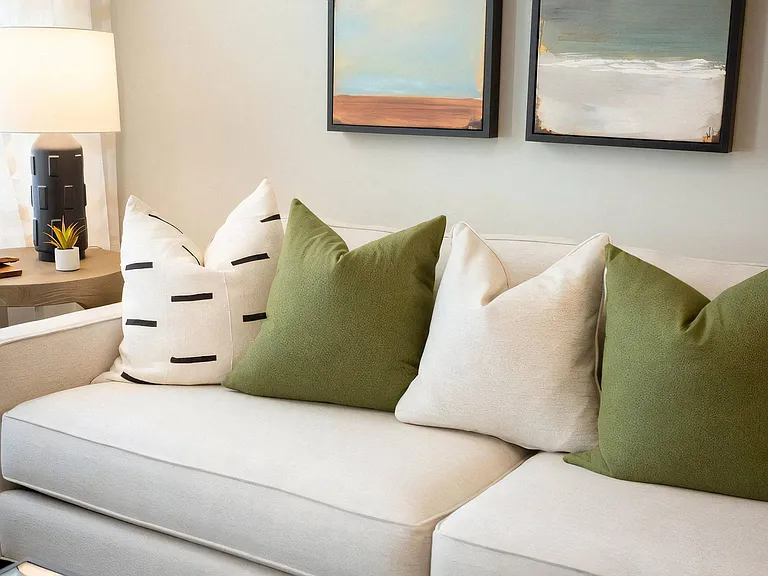 Interior Lounge Area with Accent Pillows and Side Table