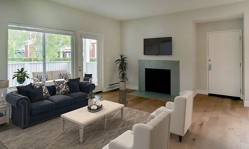 LR, fireplace & patio view