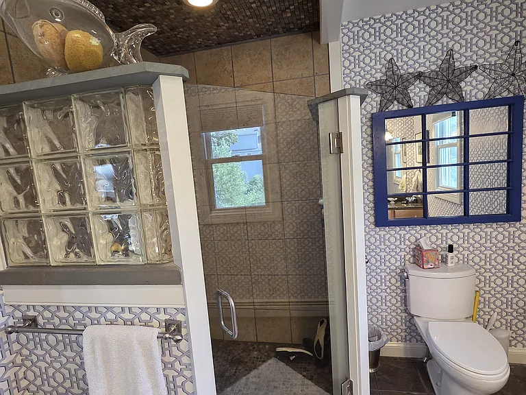 Main Bedroom bath with rain shower and wall water jets