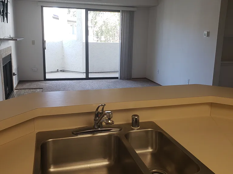 Kitchen opens to living room
