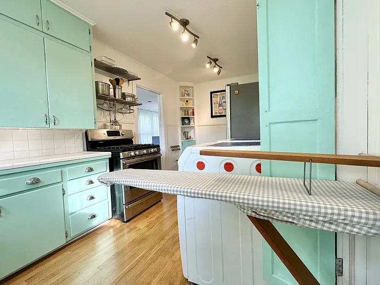 Interior Photo - Kitchen (includes built-in ironing board)