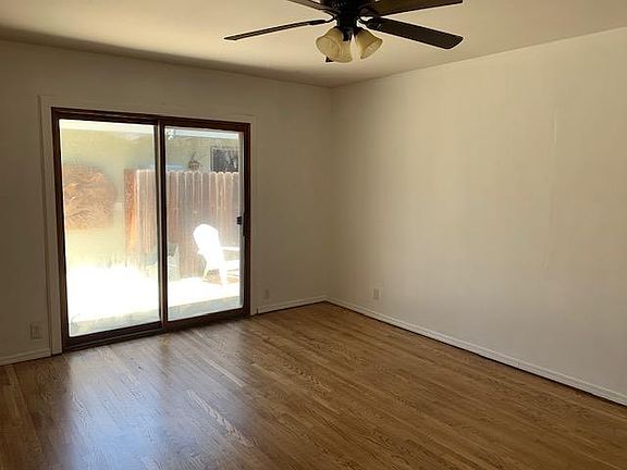 One view of larger main bedroom