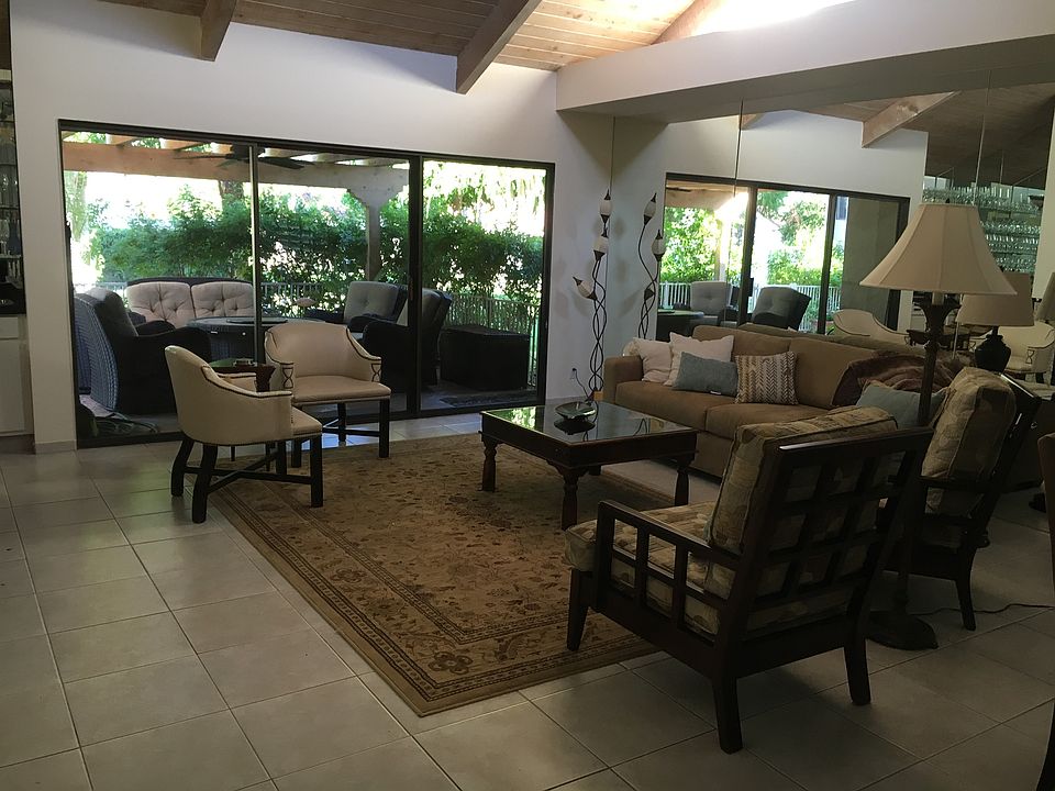 Living room with mounted tv,