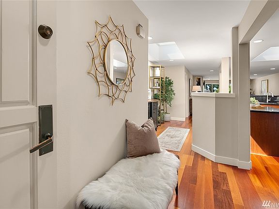 Welcome home. Top floor luxury condo is light and bright with skylights & has been remodeled throughout with designer touches and elegant finishes. 