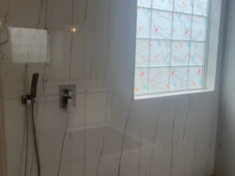 M. Bathroom with Large shower.
