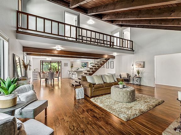 Beautiful woodwork/pre finished Acacia hardwoods throughout & freshly painted.>
