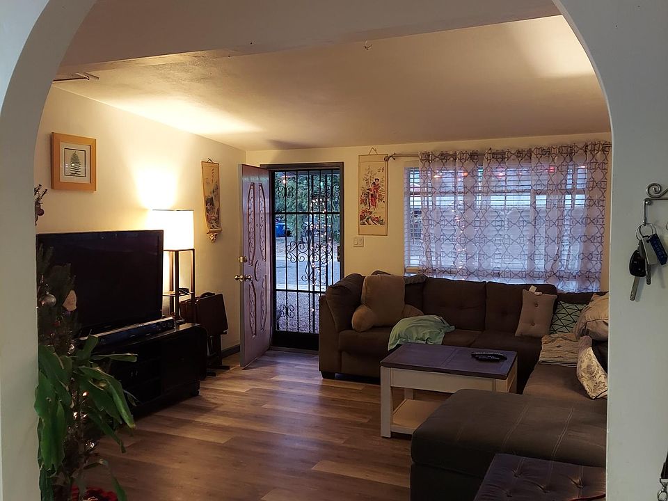 Living Room, front window has view of the Catalina Mountains