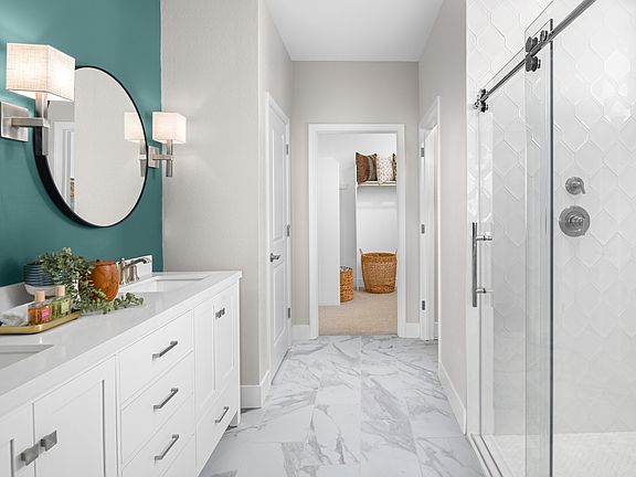 Primary bath with glass shower enclosure