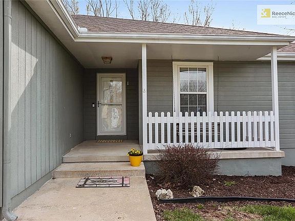 Welcome Home! This could be your new address!  Wait for your family to come on your front porch swing.