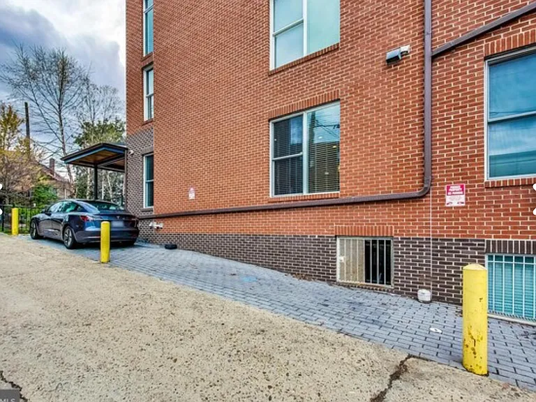 Assigned parking spot by the unit in the alley.