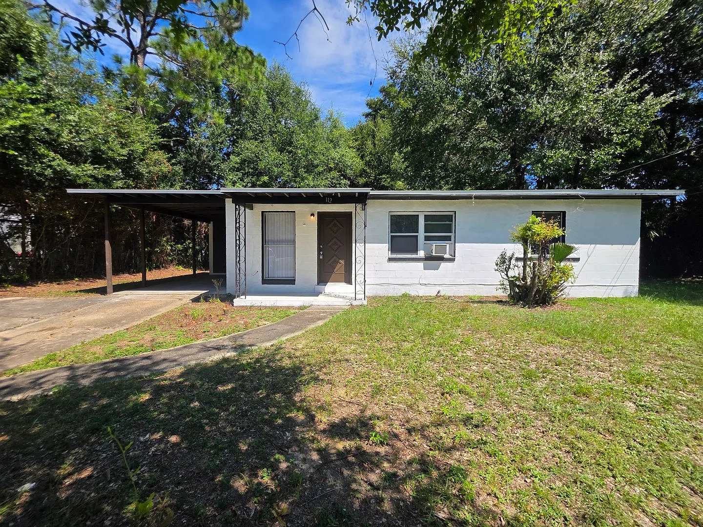 3BR/1.5BA on large lot with covered parking and neighborhood park — Photo 1