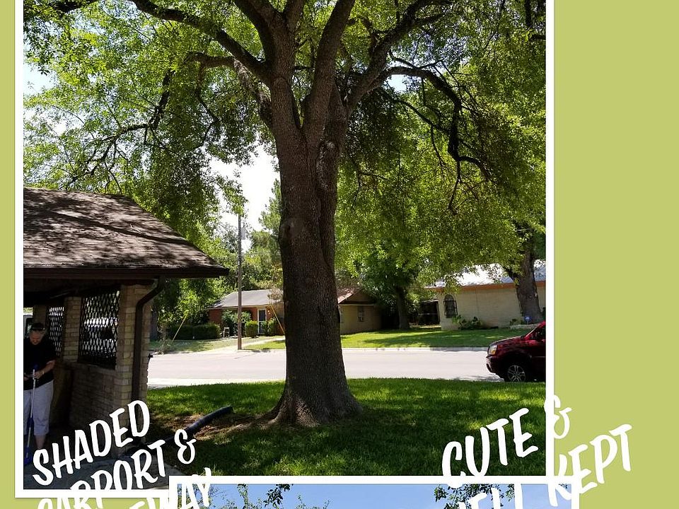 Nicely kept shaded corner lot with adjoining carport