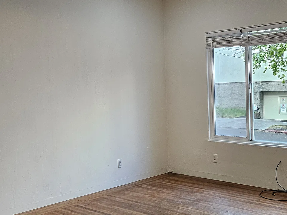 View of main room from unit interior hallway