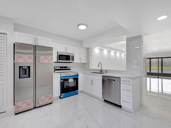3rd image of 7320 Amberly Lane #105