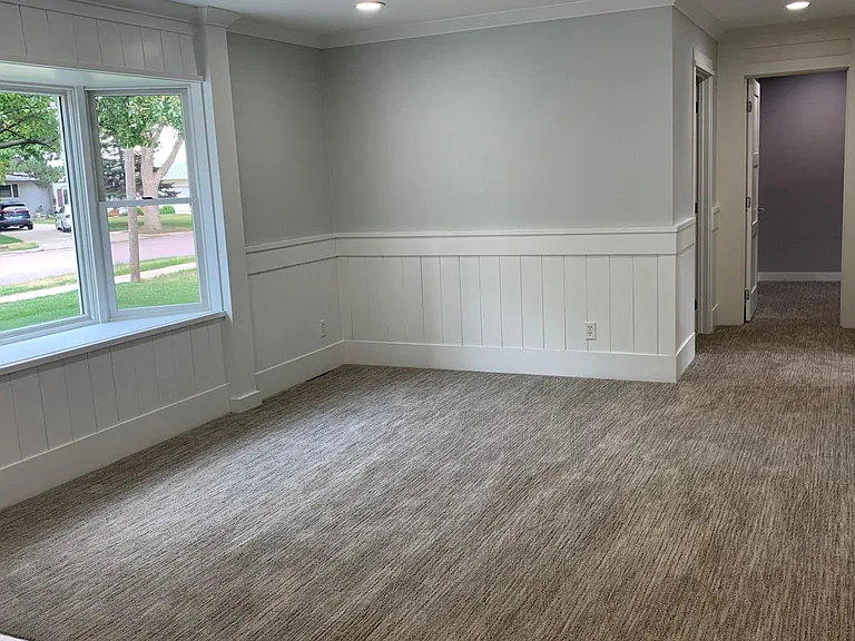 Upstairs living area showing hallway to mater bedroom