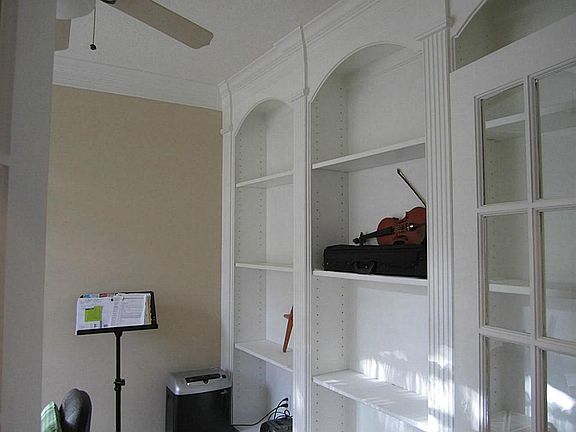 Study room with nice built-in and French doors