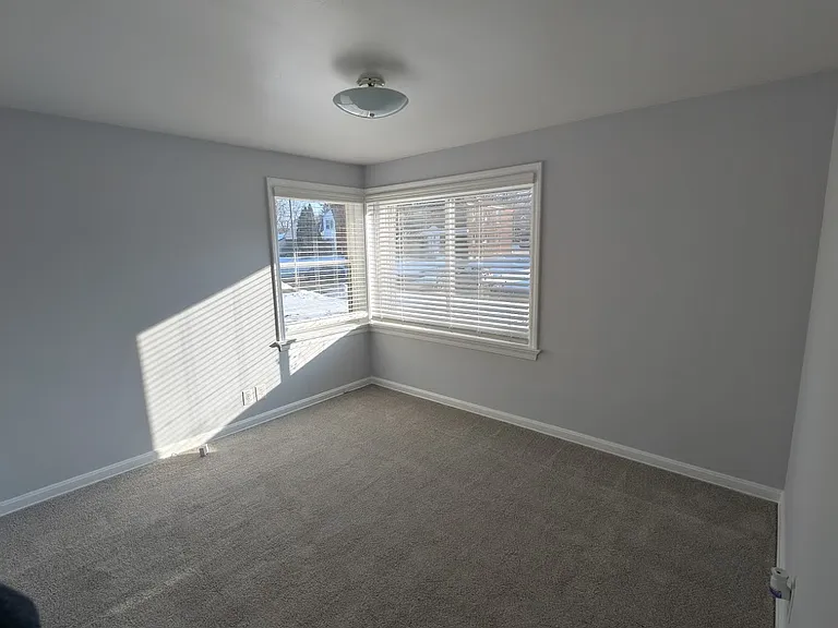 Front bedroom with east facing window.