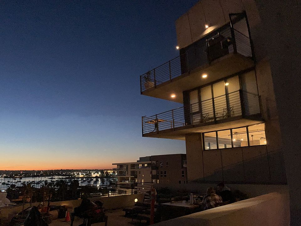 Nighttime view from the building''s rooftop deck