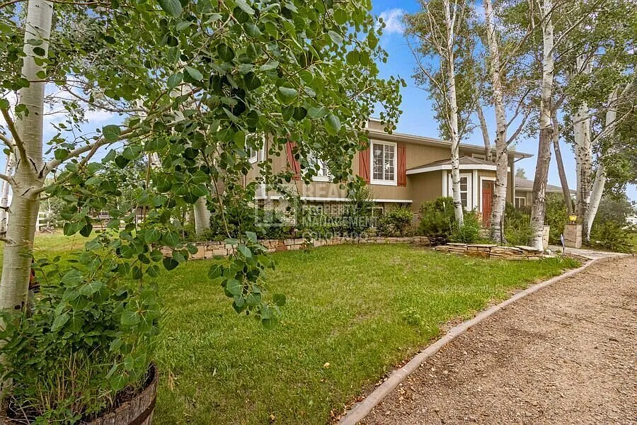 Charming Country Home with Scenic Mountain & Lake Views 23551 County Road 5, Loveland — Photo 4