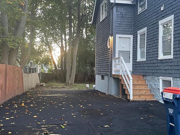 Newly paved Driveway with extra large backyard!