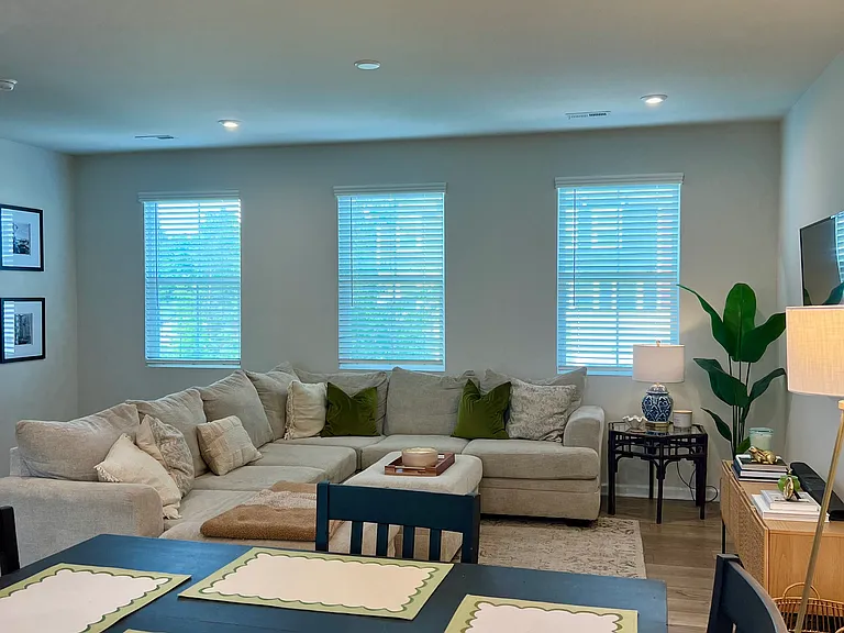 dining room table, sectional couch, and console table under TV can be included in the lease