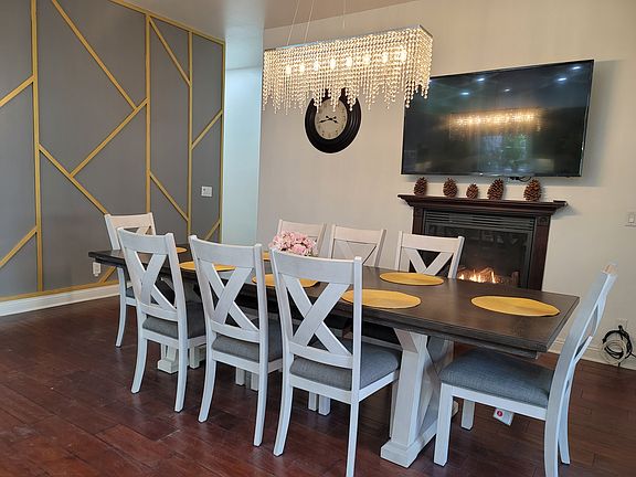 Dining room with TV and Fireplace