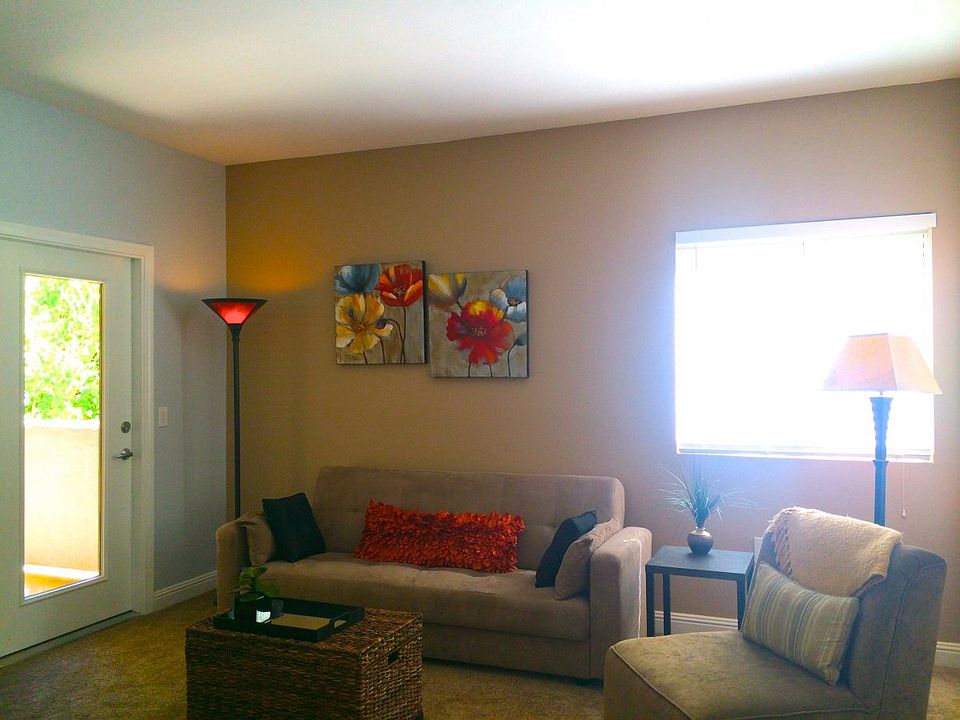 comfortable seating area, pull out couch, entry to balcony
