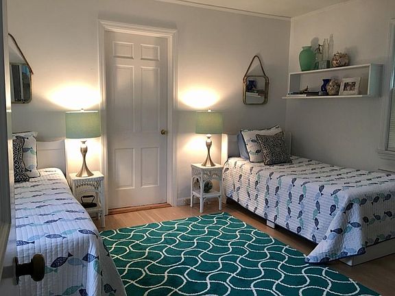 Bedroom (part of jack & jill connecting bedrooms) with 2 twin beds and closet