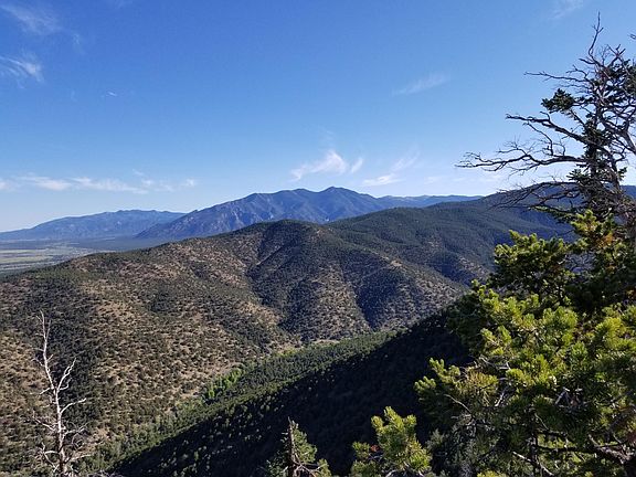 taos canyon heading east to angel fire and eagle nest lake. taos mountain in the distance.