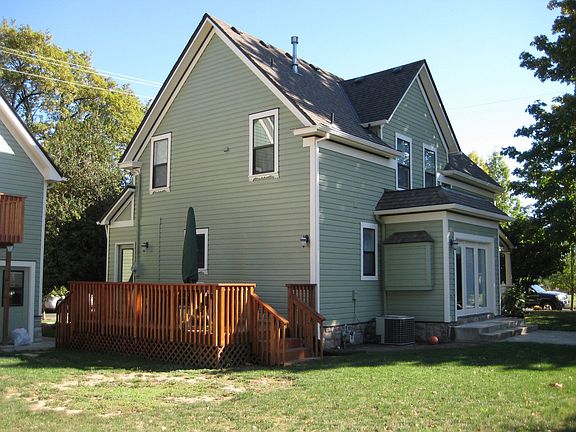 Rear of main house showing sun room and rear porch.