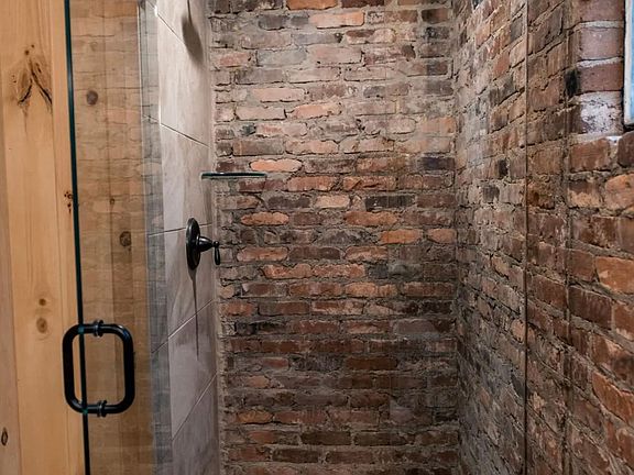 Exposed brick shower