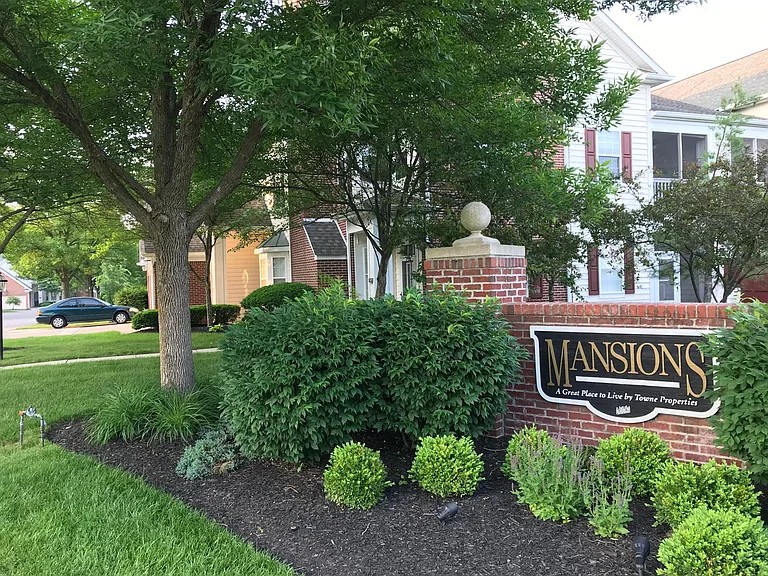 The entrance of Mansions - 7573 B condo right ahead
