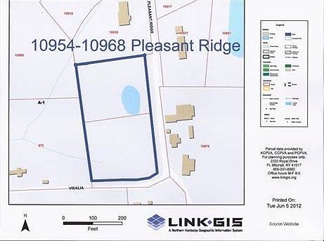 The two lots are over 2 acres, and contain a pond.