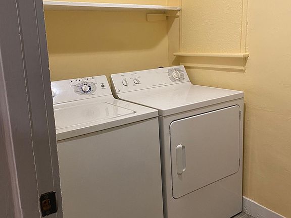 Washer/dryer off kitchen.