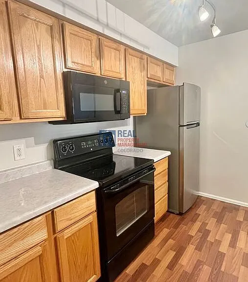 10784 W 63rd Pl #103 — Photo 8
