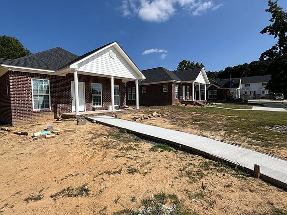 Adjoining 2 additional homes in new Subdivision entitled "Charlestowne Landing" All brick exterior, vinyl eaves, shingles, very-low maintenance