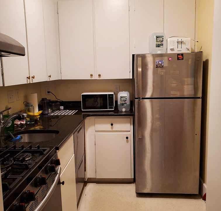 Updated kitchen with stainless appliances, granite counters and plenty of cabinet space.