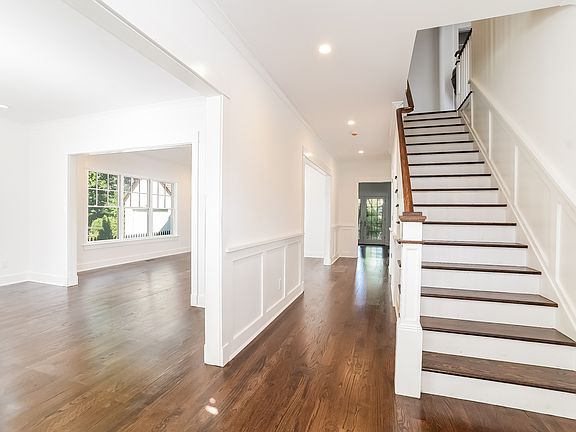 Entry hallway with wainscoting