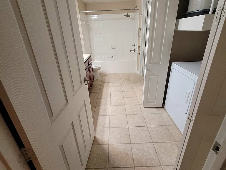 View into bathroom from living area
