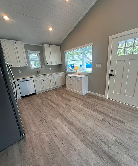 Ceiling can-lighting and neutral paint throughout