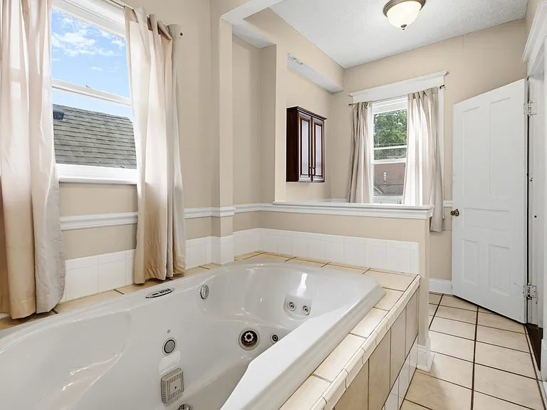 Master bath with tub and shower