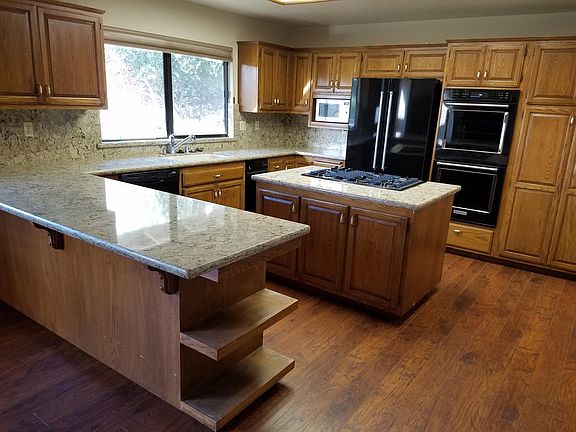 One year new kitchen counter, appliances, flooring throughout.