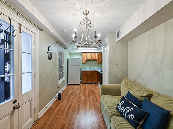 Pull Out Sofa and Fun Chandelier - furnished