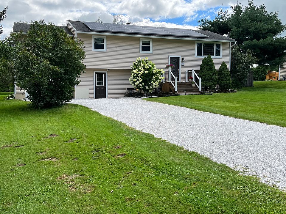 Front view w double lane driveway
