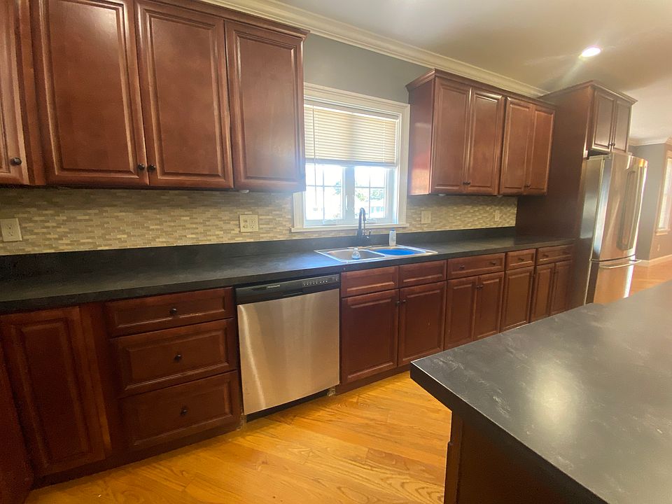View of the kitchen sink and stainless dishwasher...a beautiful bonus!