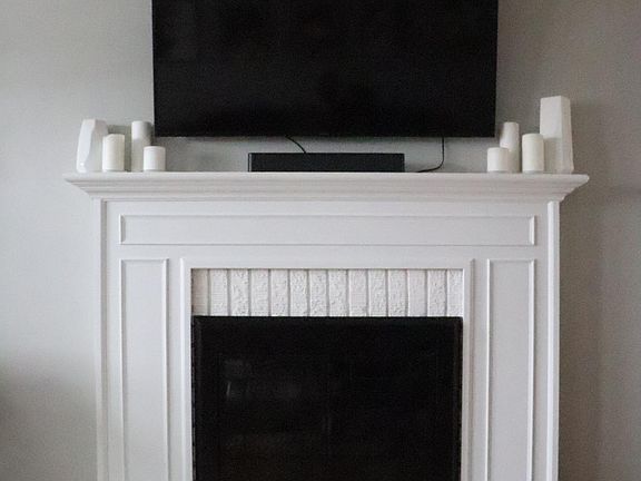 Main living room fireplace, taken from living room couch area.