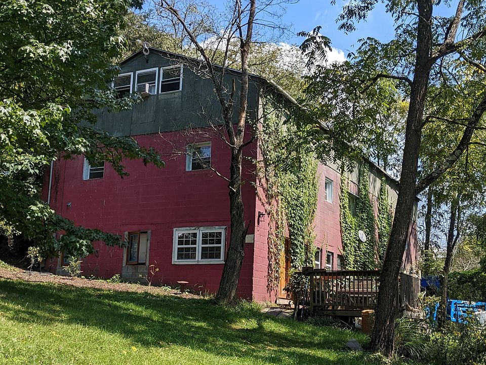 Outside of house. The apartment is the middle / main floor.