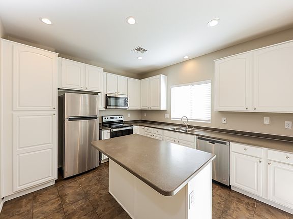 5th image of 14171 W Country Gables Dr